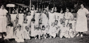 Junior Club from Logan, WV in 1924. Several Juniors proudly don their red Service Caps.
